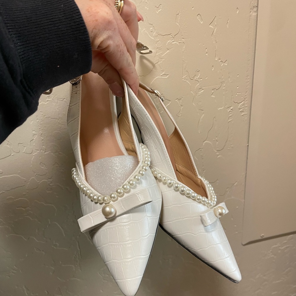 white pointed toe sling backs